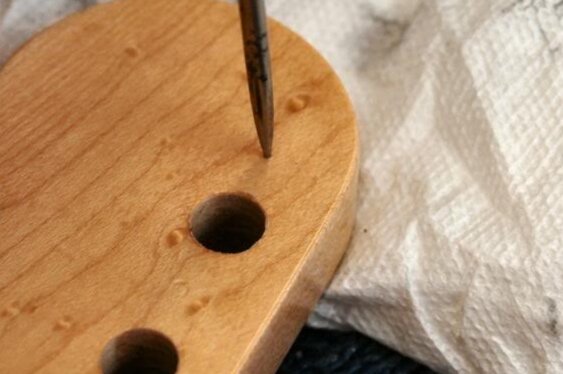  I do this in each of the 6 holes, then using an awl, mark the 1st and 6th. 