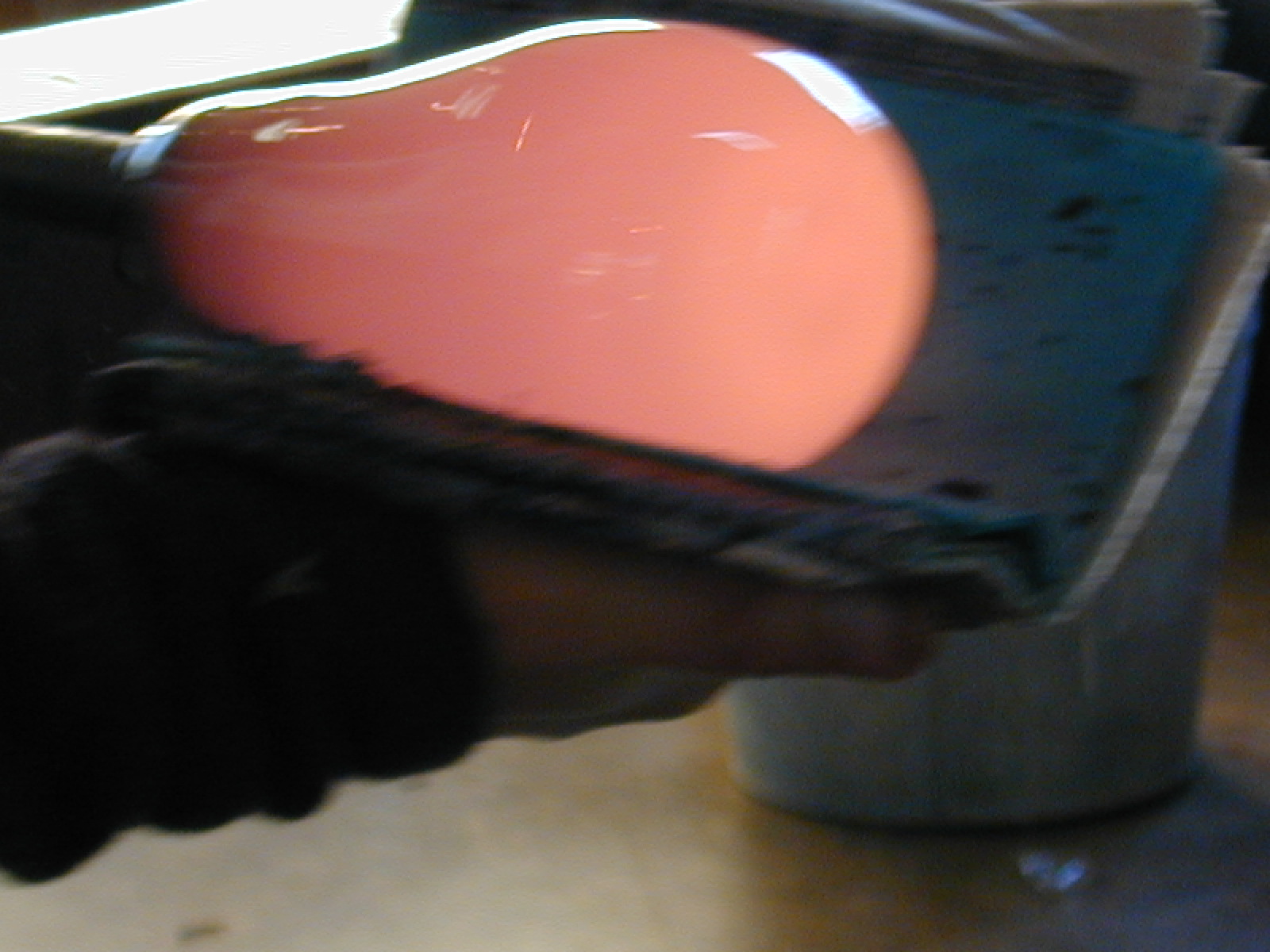 Shaping hot glass with wet paper pads