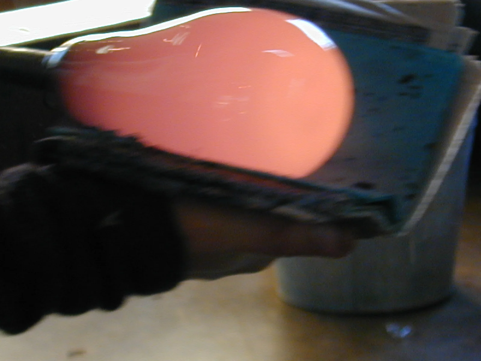 Shaping hot glass with wet paper pads