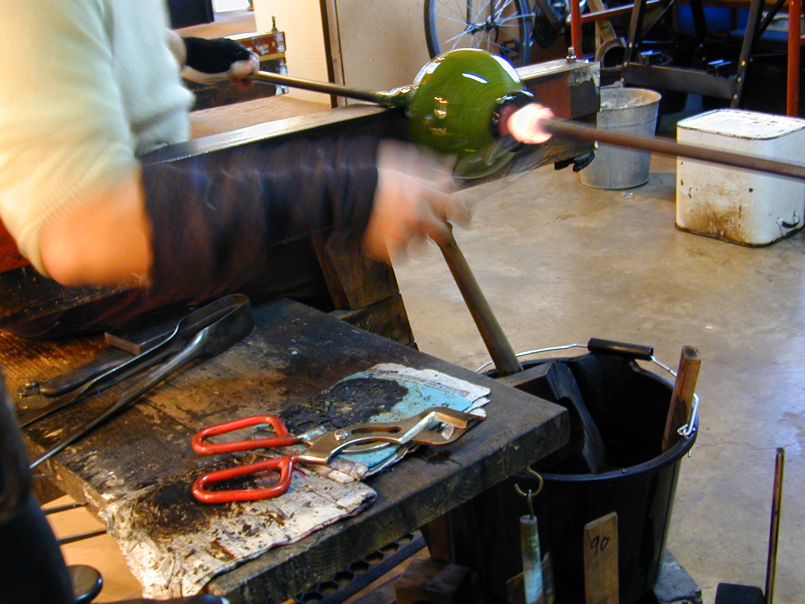The punty iron added to base of the bowl.