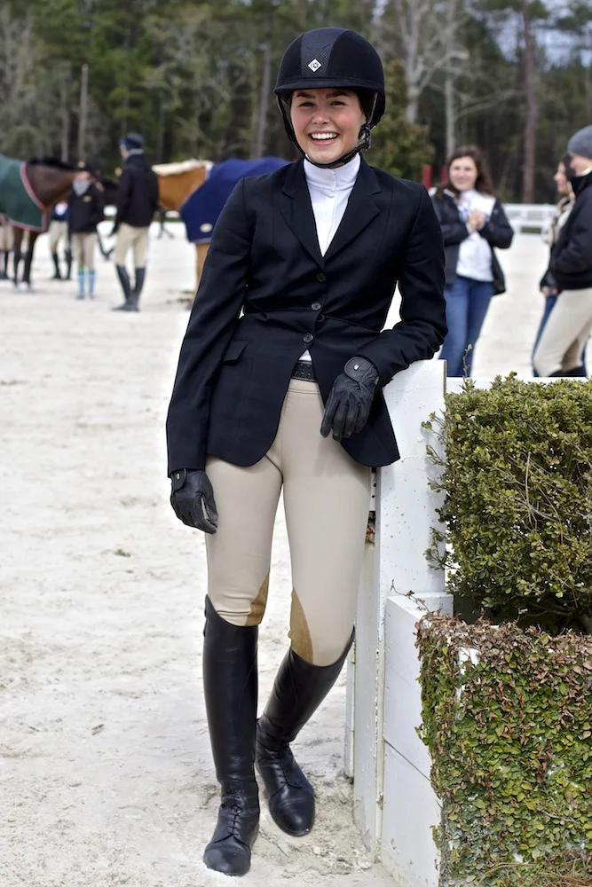 SCAD student horse-back rider poses during a break in the Region 5 Zone 5 Equestrian Show