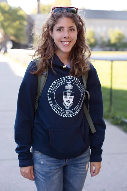University of Toronto female student showing her school pride through her crewneck sweater