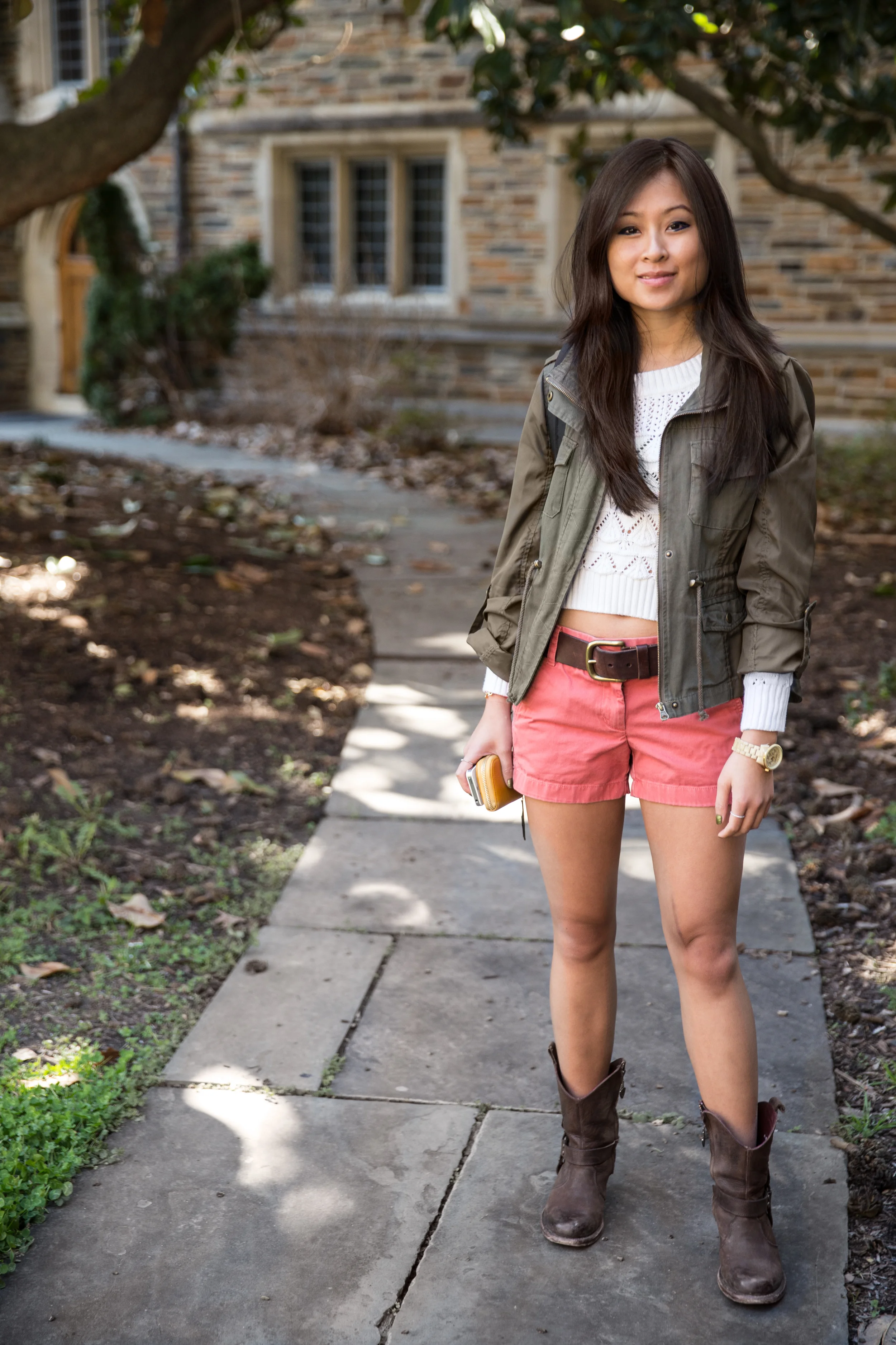 Christina | Duke University Nantucket Red Shorts; Cowboy Boots, White sweater; American Rag Military Parka for Macy's