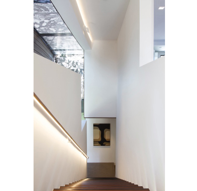 In the photographic work, On the Boulevard (40.5 x 30" canvas), the artist deploys a sense of light movement similar to the sun moving across the brise-soleil. 