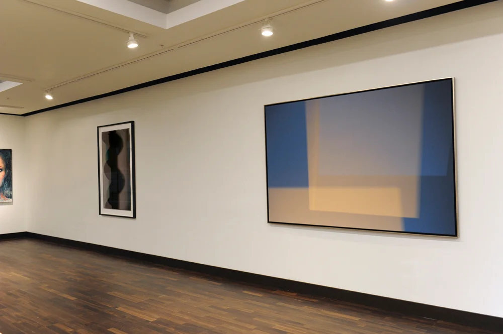 Spaces Within II (2014) abstract photography by Steven Silverstein, installed in the JW Marriott gallery's permanent collection. 56 x 85 inches (142.2 x 213.3 cm) canvas. Black Queen (to the left) was also on loan for the gallery opening.
