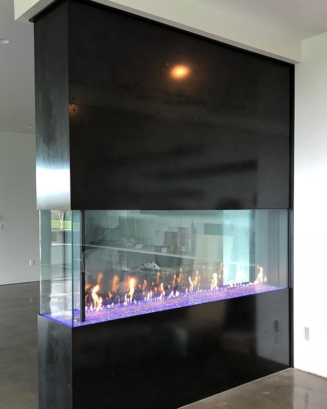 Friday and this fireplace is finish!  Thanks @misturmetals for the blackening #custom #lasercut #steelfireplace #northrupfab #fireplace #blackensteel