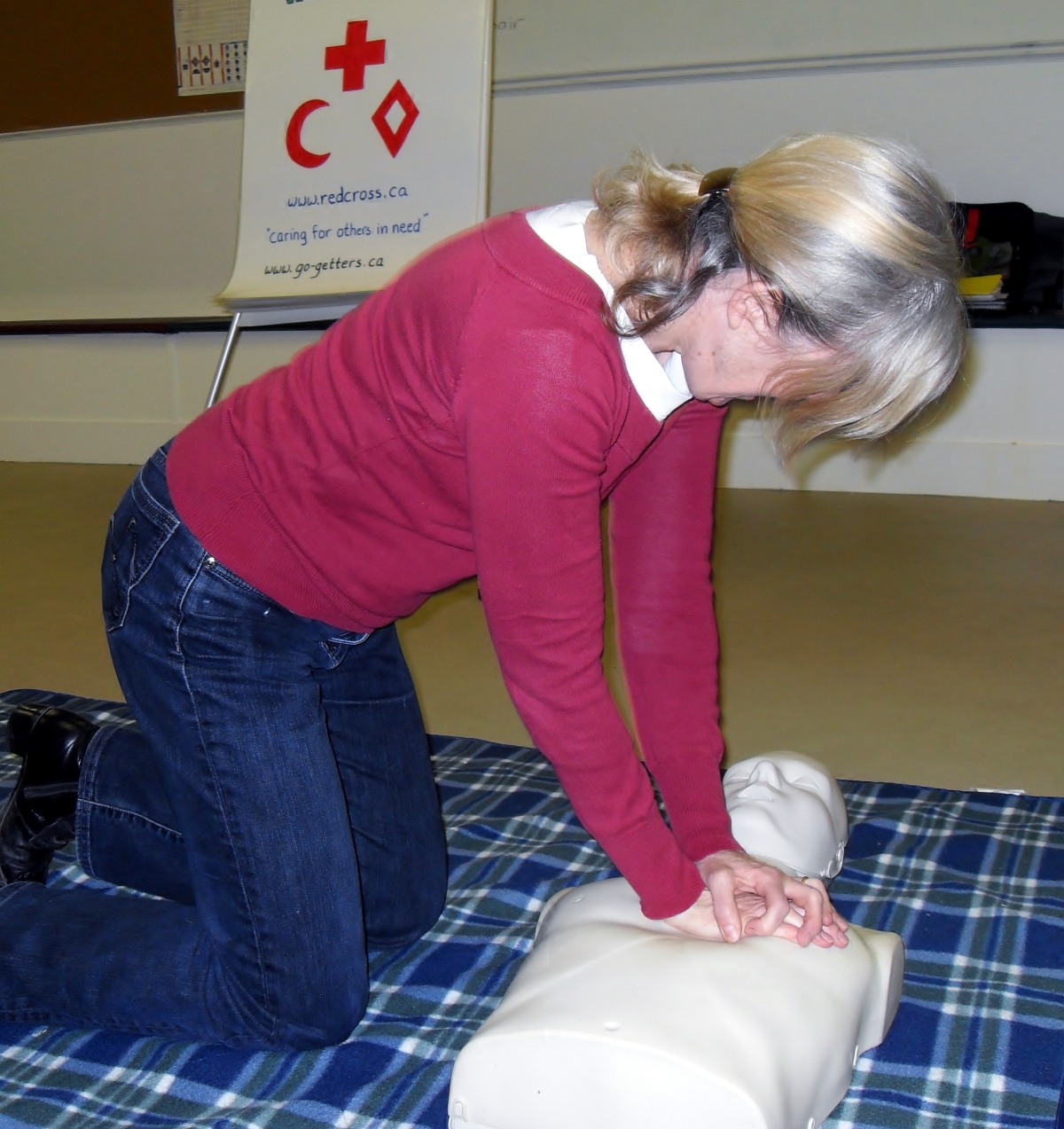 woman practicing CPR