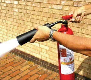 fire extinguisher in use.jpg