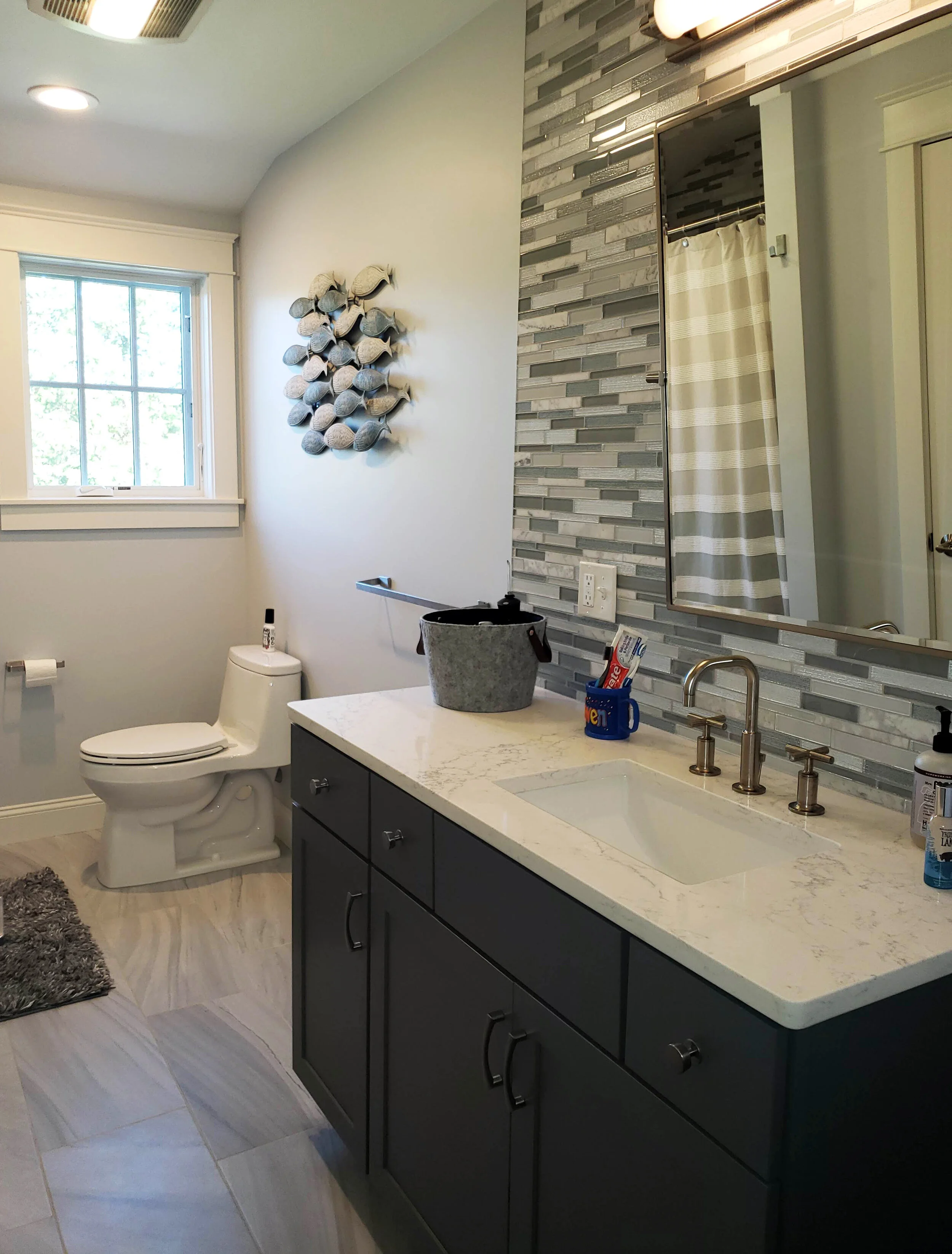 Shared bath with tiled feature wall