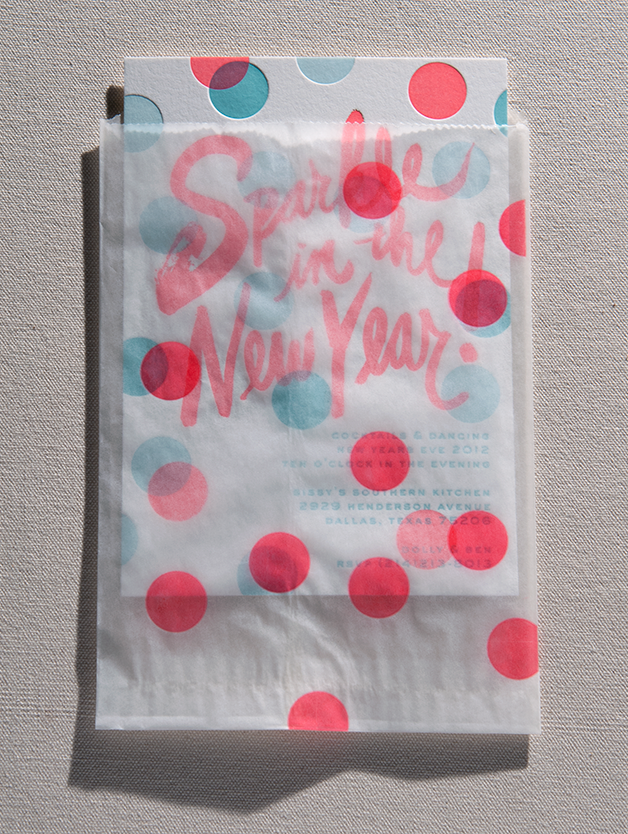 Invite with glassine envelope.