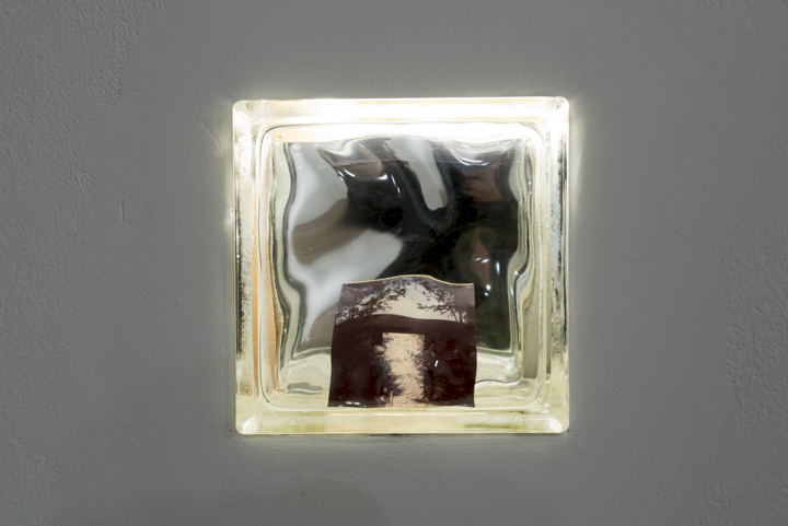  Structure Given to Light, 2014  glass block, photo, mirror, light  8"x8" 