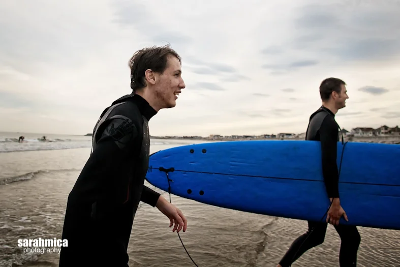 Waypoint co-founder, Dan Minnich, leads a proud adventurist out of the ocean and back to the shore