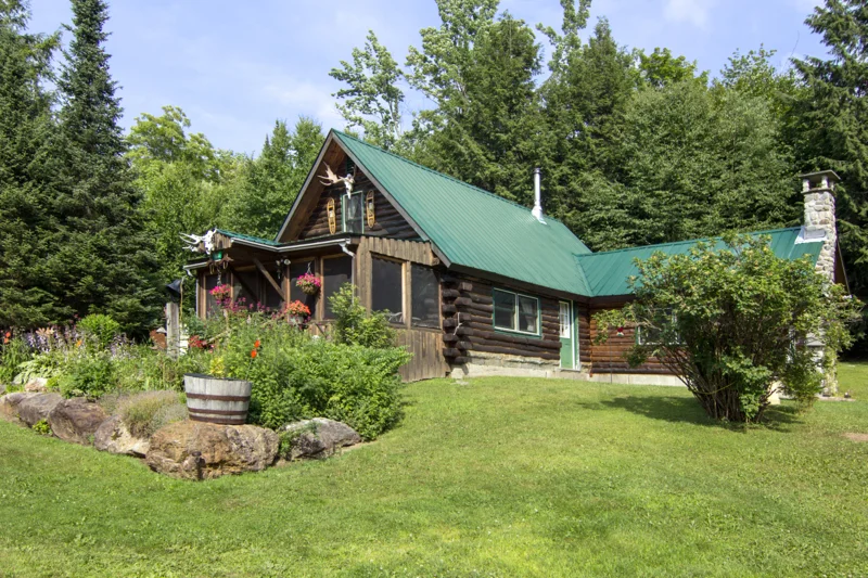 Log home on 22 totally private acres with a large 2-car garage/barn right behind me