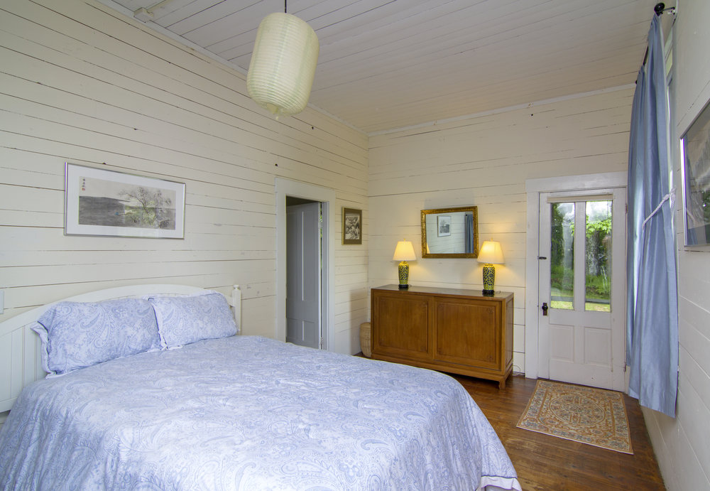 Schoolhouse Master Bedroom with a Full Bath