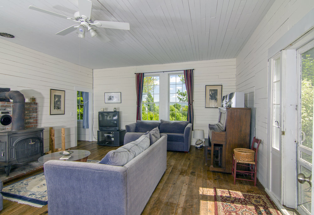 Schoolhouse Living Room has a fireplace