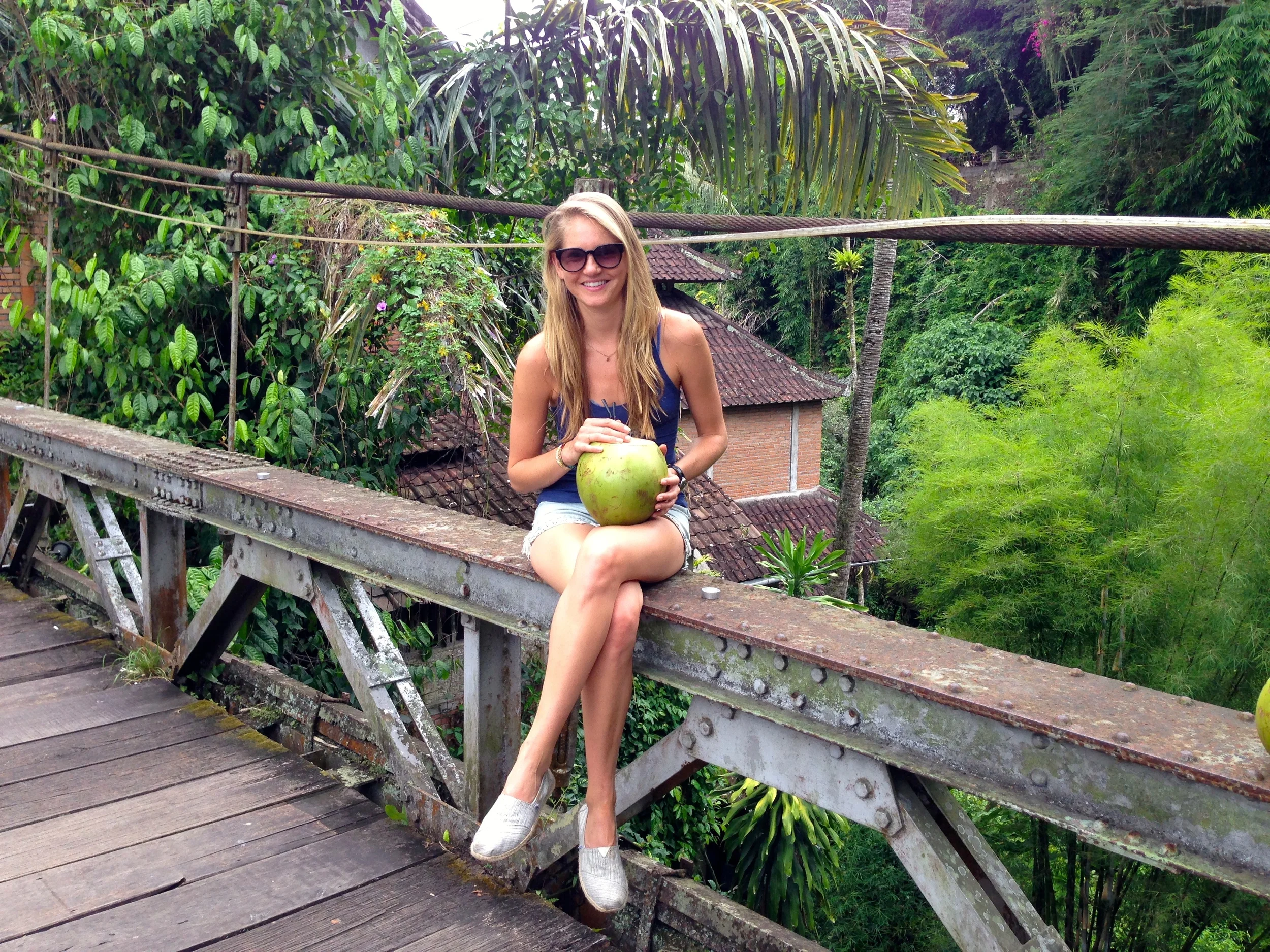 Taking a break with a coconut on the walk to Alchemy 