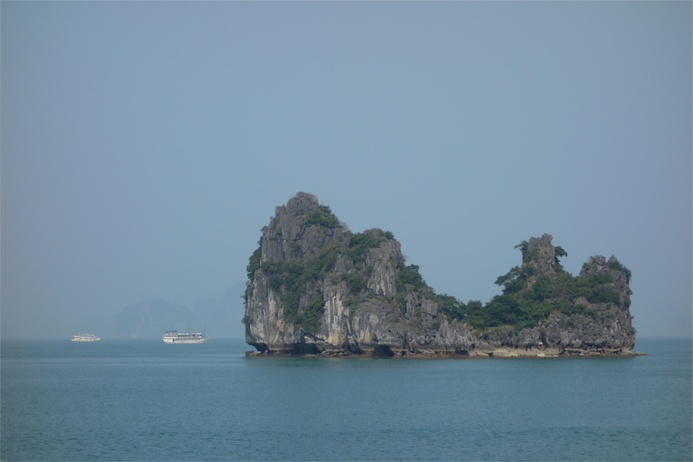     Ha Long Bay, a UNESCOWorld Heritage Site, is absolutely breathtaking with thousands ofmonolithic limestone islands rising from it's emerald waters.  