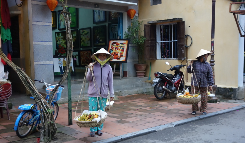   Hoi An, another UNESCOworld heritage site was the site of the first chinese settlement inVietnam. It used to be a major South-East Asian trading centre fromthe 15th to 19th century. Today, Hoi An  is adelightful little town. Taking a walk down the alleys of the oldtown, with well preserved buildings from the past, which have nowbeen converted to temples, emporiums, and museums, it is not veryhard to imagine how life would have been back then. The colourfulmarkets light up at night where you can buy anything and everything.Tailor made shoes and clothes are a speciality of Hoi An. You'll seenumerous shops lined up where they can make lovely shoes and dressesfor you, in just one day!  