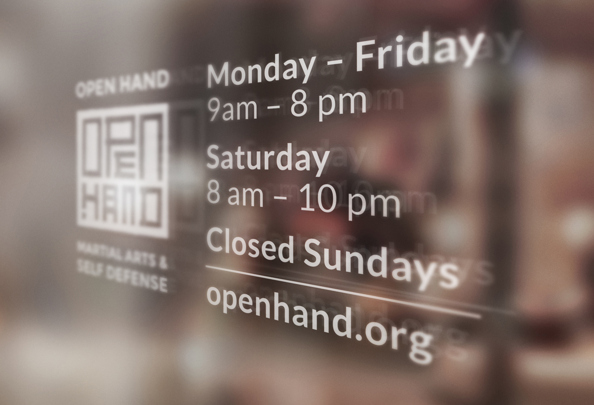 The Open Hand branding (including the tatami ratio) is carried over onto everything from uniforms to window lettering. The tatami ratio defines not only layout, but type size calculations.