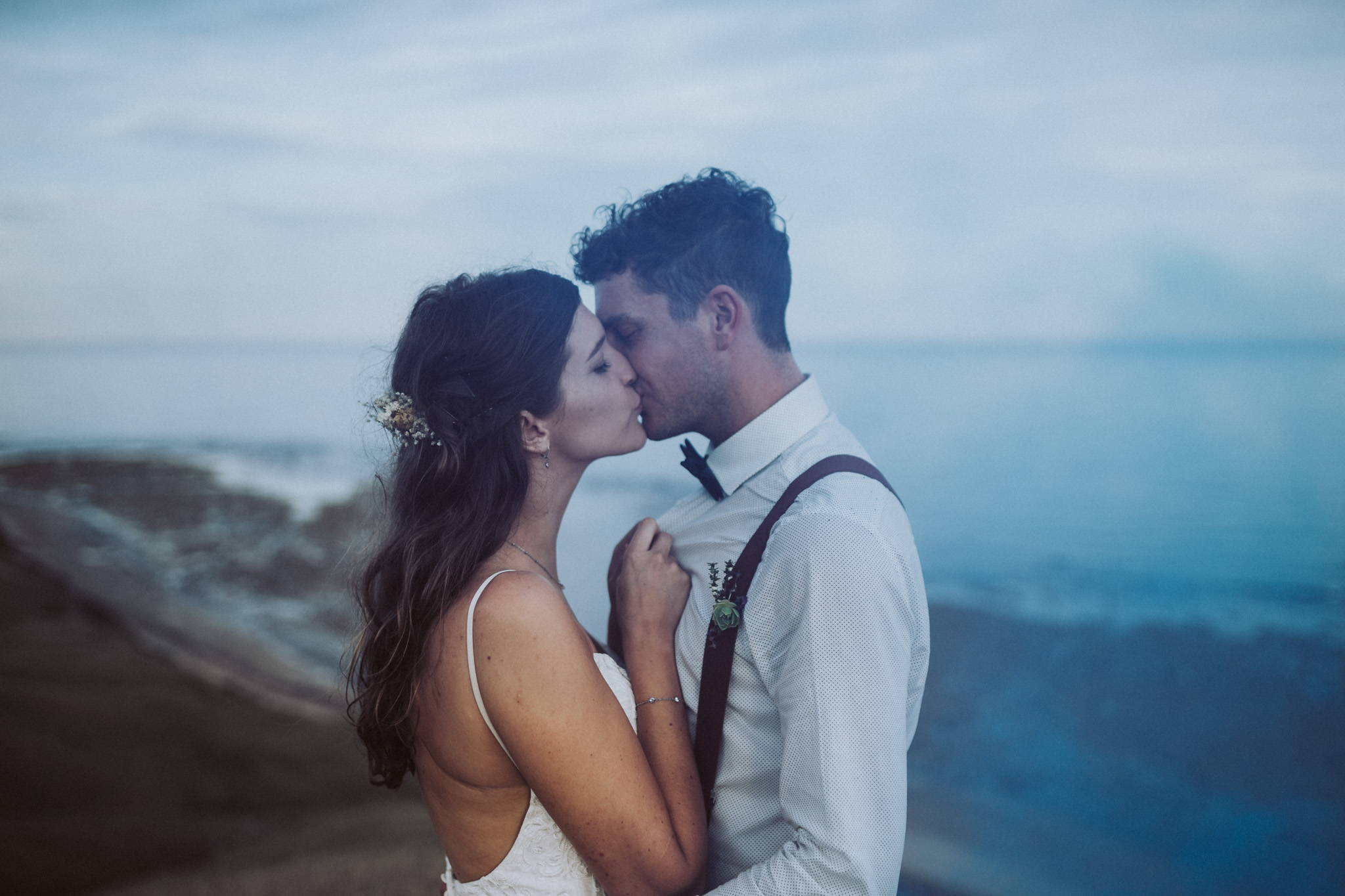 I've been waiting to blog this wedding since before I even shot it! First of all, just take a look at Gillian + Michael, not only do they look gorgeous on the outside, they are also beautiful on the inside. Secondly, that view was errrmeegerd (I was sweating like a pig on a spit after that 30min hike up the hill!) Thirdly, Gillian + Michael chose to do a ‘first look’ and it was such an incredible feeling being able to capture it for them. And lastly, the day was perfectly capped off with the most beautiful sunset. Hawkes Bay put on a stunner for these two, it was just us three, the Celebrant Wendy Morrison and her husband Doug (legend, carrier of all things and second witness - I was the other!). Gillian + Michael // Hawke's Bay https://davidle.co.nz/gillian-michael-wedding Dress RSVP Bridal Couture Hastings Head piece Rock'n Rose (Asos) Rings Sorella Diamond Jeweller Palmerston North Shoes Overland Shirt Country Road Pants Hallensteins Suspenders NZties Bowtie Bachari Menswear Palmerston North Celebrant Wendy Morrison