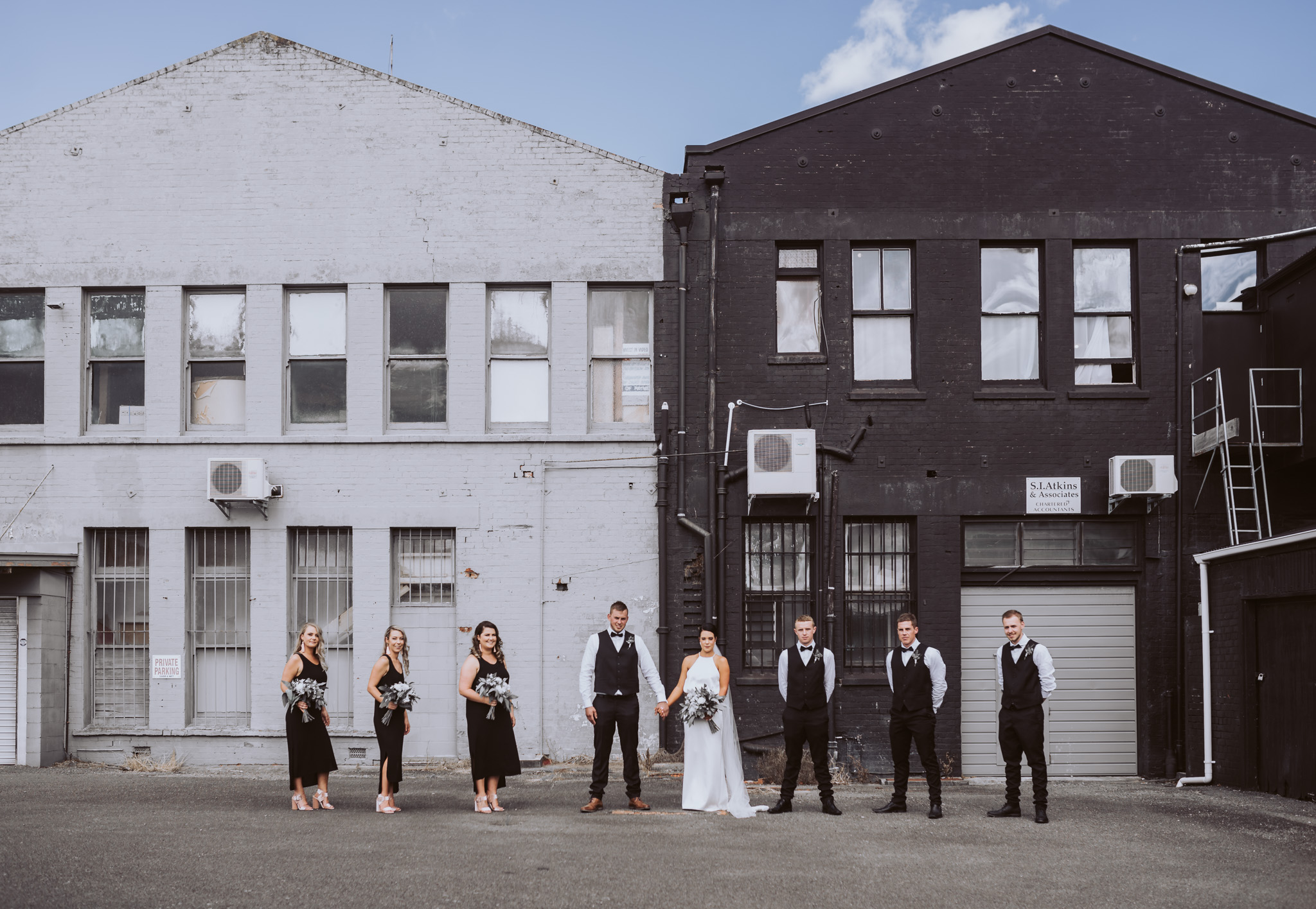 A little bit of black and white - Michelle + Mark with the crew filling The Space