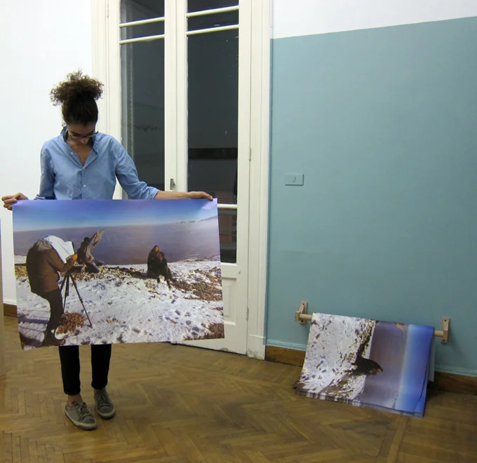 Please Stay Blurry, 2013, Offset print, 100 x 70 cm giveaway poster, edition of 500, wooden rod installed close to the floor. Installation view, Nile Sunset Annex, Cairo, Egypt.