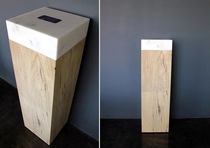Proposal for a Romantic Sculpture, 2012, Video embedded in a sculpture. Video: 5 min. loop on iPod/iPhone, commissioned tattoo of song title ‘ne me quitte pas‘ by Jacques Brel. Sculpture: 29 x 29 x 100 cm, marble and wood.