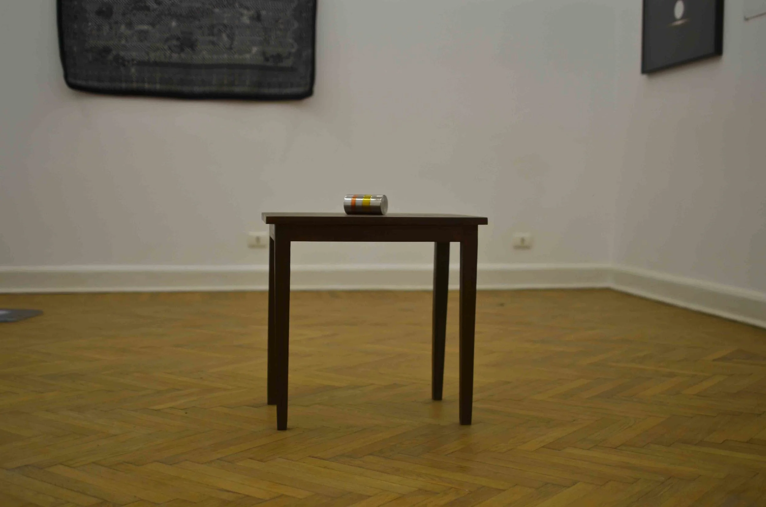 Hassan Khan, Dense Object, 2013, Cylindrical object composed of Aluminum, Brass, Copper, Iron Stainless Steel. 15 x 6 cm