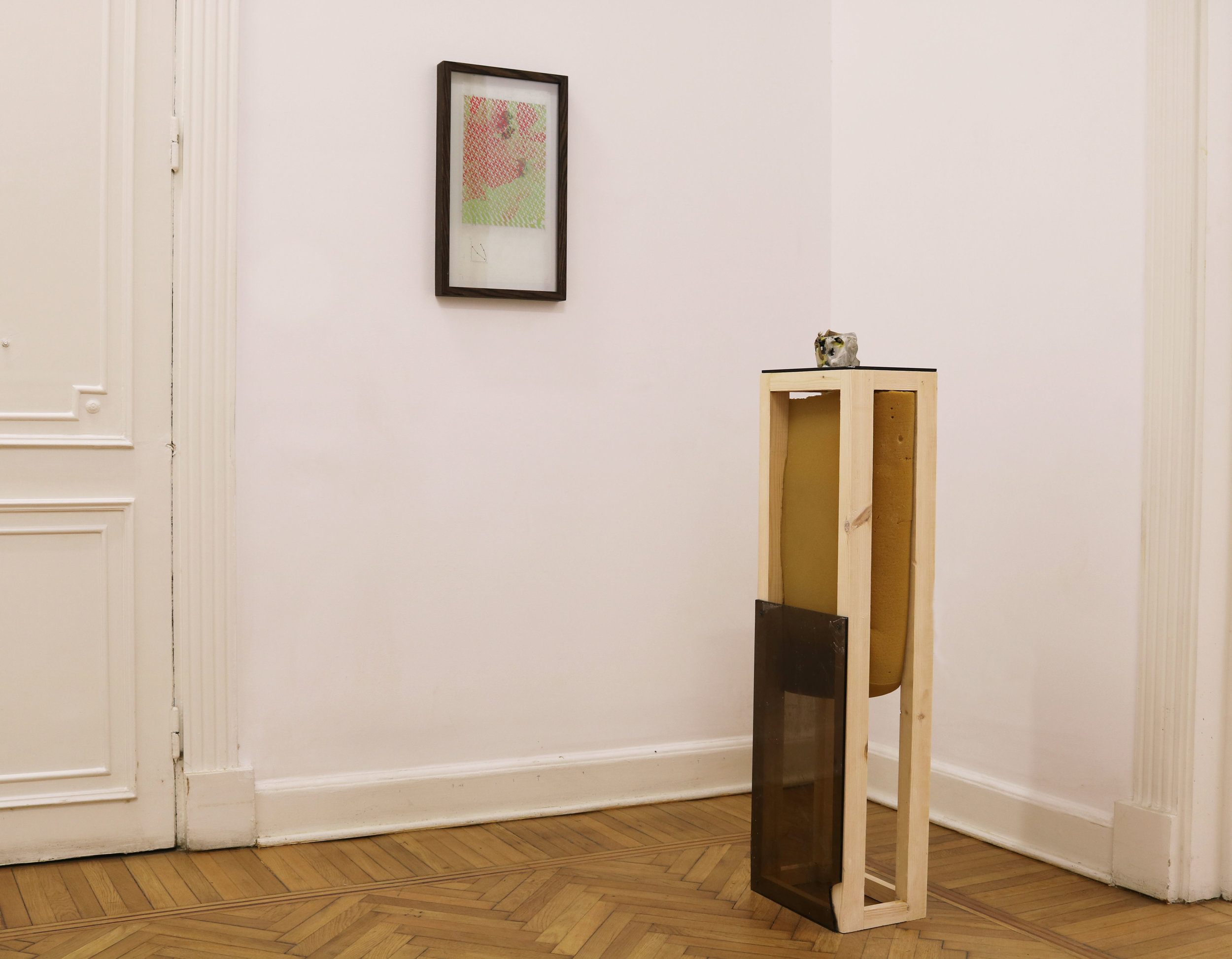  Installation view including framed artwork. In the foreground cube sculpture (Paperweight #2) with pedestal. Pedestal with tinted glass from my father's office, foam. 