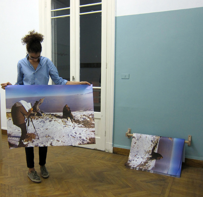  Please Stay Blurry, 2013, Offset print, 100 x 70 cm giveaway poster, edition of 500, wooden rod installed close to the floor. Installation view, Nile Sunset Annex, Cairo, Egypt. 
