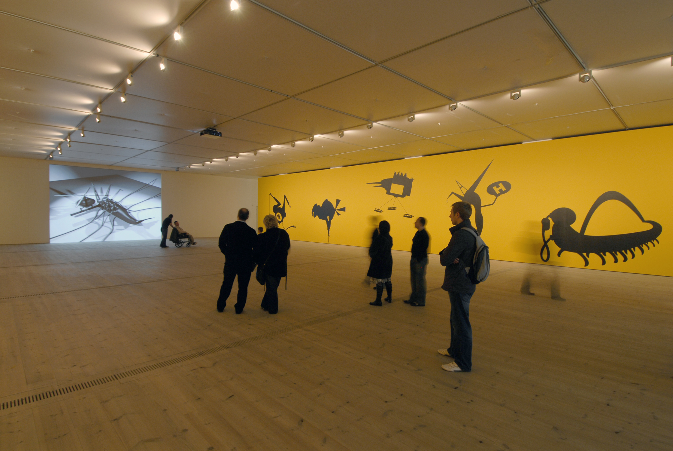  The Bride Stripped Bare by Her Energy's' Evil, 2006, two large scale wall paintings (10 m each + acrylic colors), audio elements and a projected short 3D animated film, 2 min. 44 sec. Installation view at BALTIC Centre for Contemporary Art, Gateshea