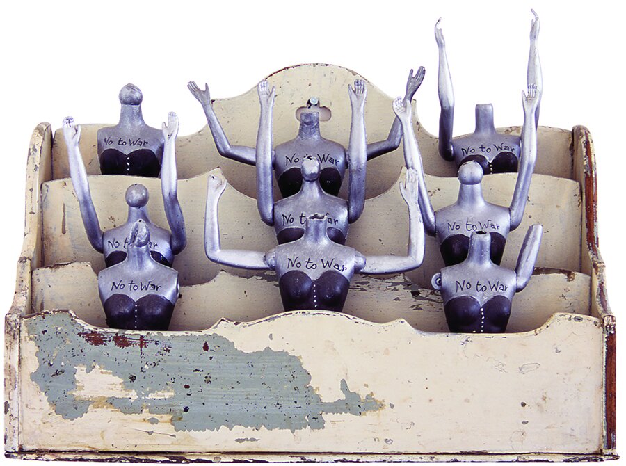  No to War, 2003, found dolls, recycled wooden paper holder, acrylic paint, 34 x 24 x 11.5 cm 