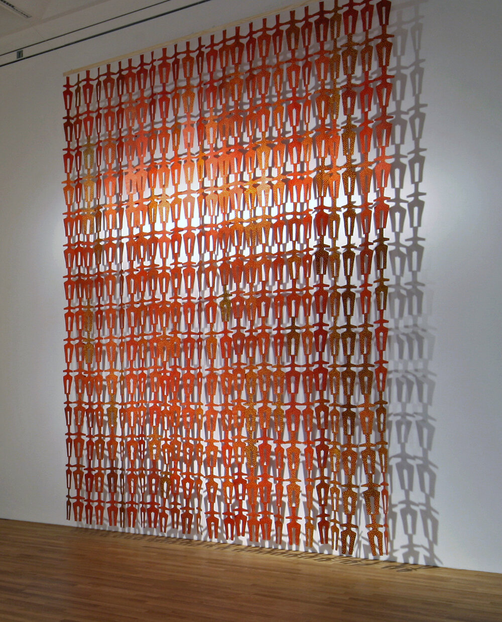  Mashrabiyya Dolls, 2006, wall installation of painted paper cutouts, 320 x 240 cm 