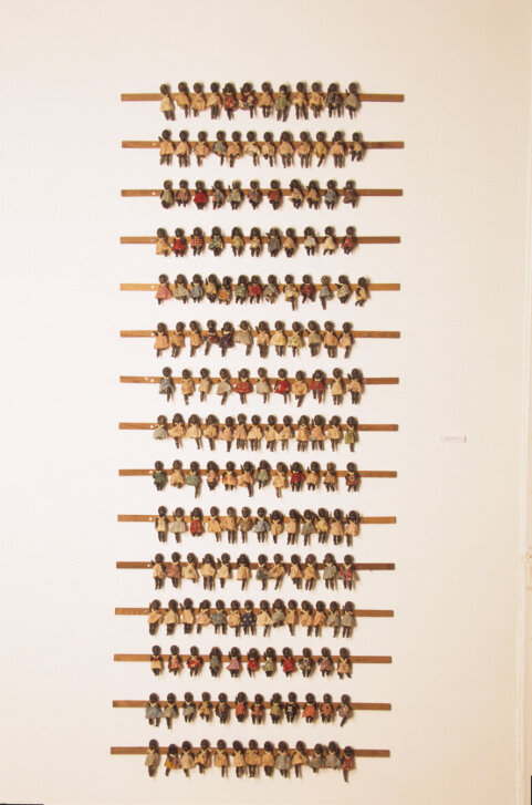  Colonial Fetish, 2006, wall installation of found dolls on wood, 90 x 180 x 5 cm 
