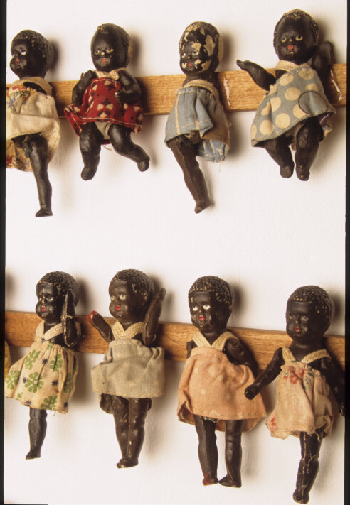  Colonial Fetish (detail), 2006, wall installation of found dolls on wood, 90 x 180 x 5 cm 