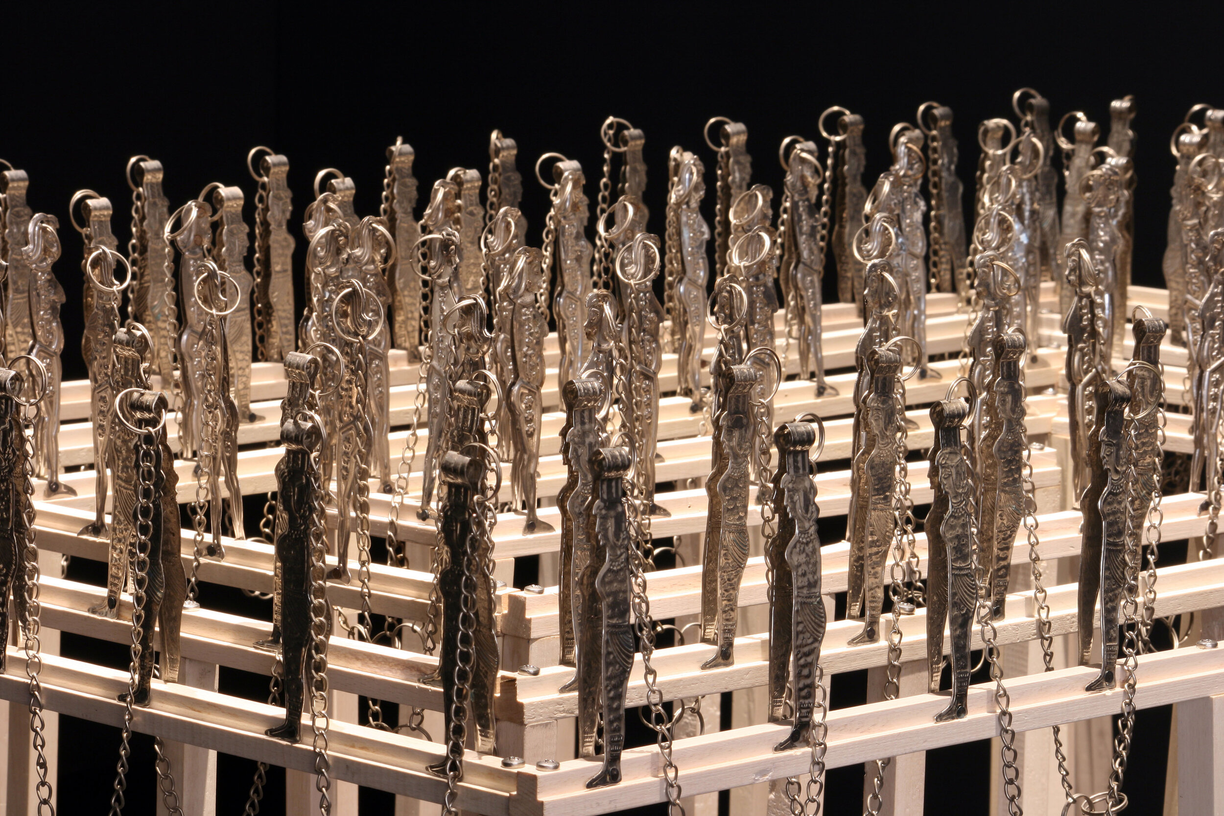  Masha Labyrinth (detail), 2006, installation of stainless steel masha dolls and wood, 180 x 210 cm x 2 