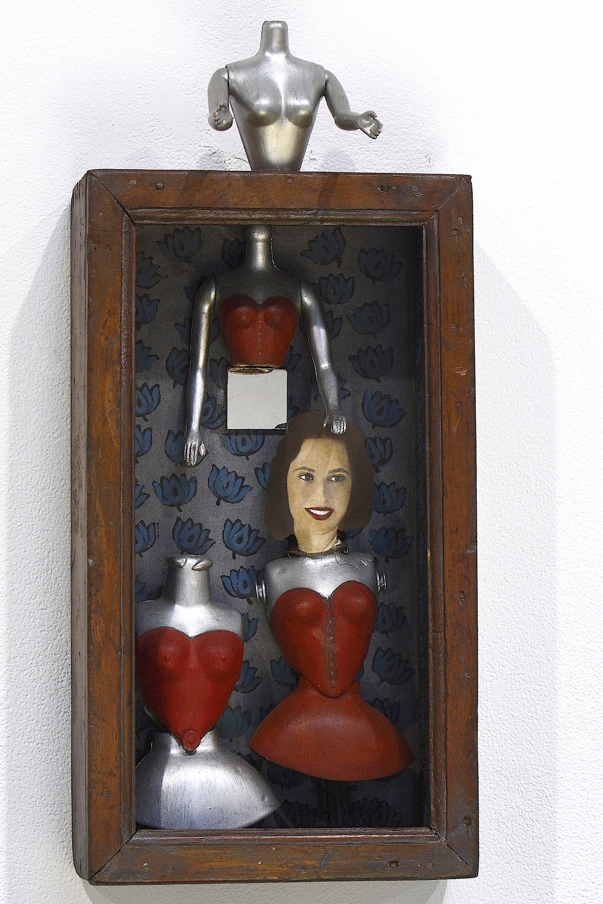  My Mother’s Dollhouse, 2006, assemblage of recycled plastic dolls, mother’s photo, found wooden box, 32 x 16 x 10 cm 