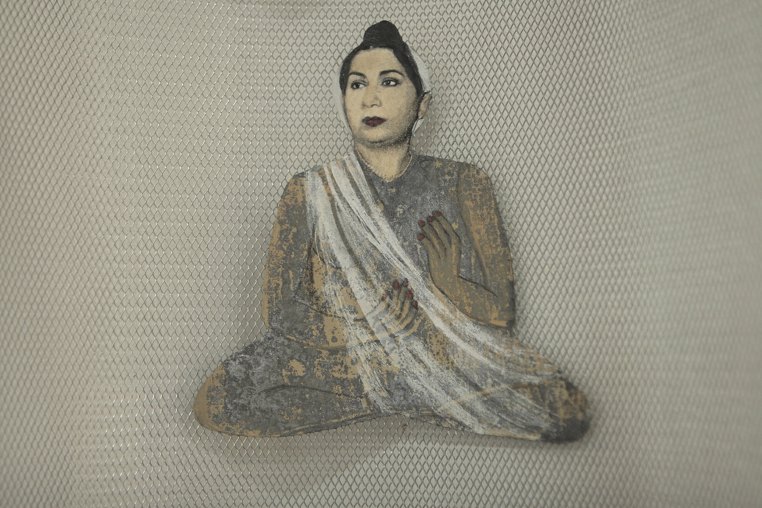  Suma Teacher (detail), 2006, painted photo collage and wire mesh, 151 x 28 x 23 cm 