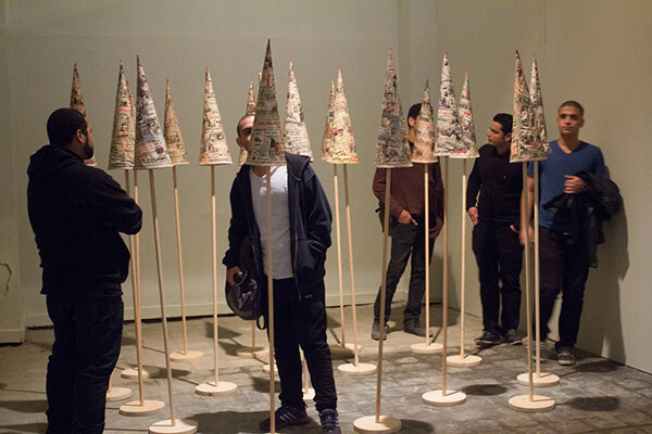  The Fool’s Journal, 2013 - 2014, installation of newspaper cut-outs on fabric, wood, 17 pieces, 52 x 19 cm diameter (each) 