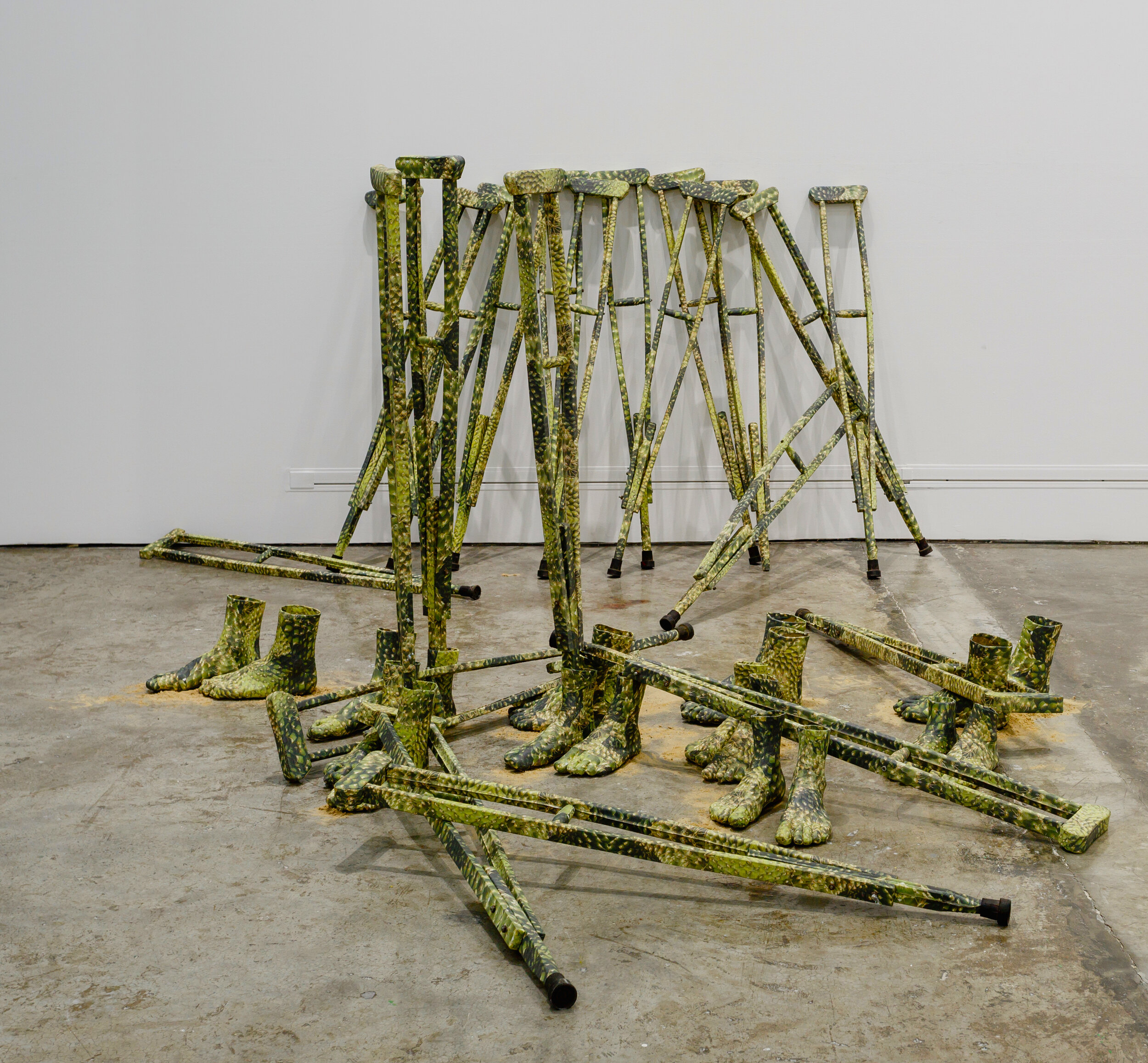  Cactus Feet, Cactus Crutches, 2016, cut-outs of printed canvas on wooden crutches, and on synthetic resin feet, dimensions variable 