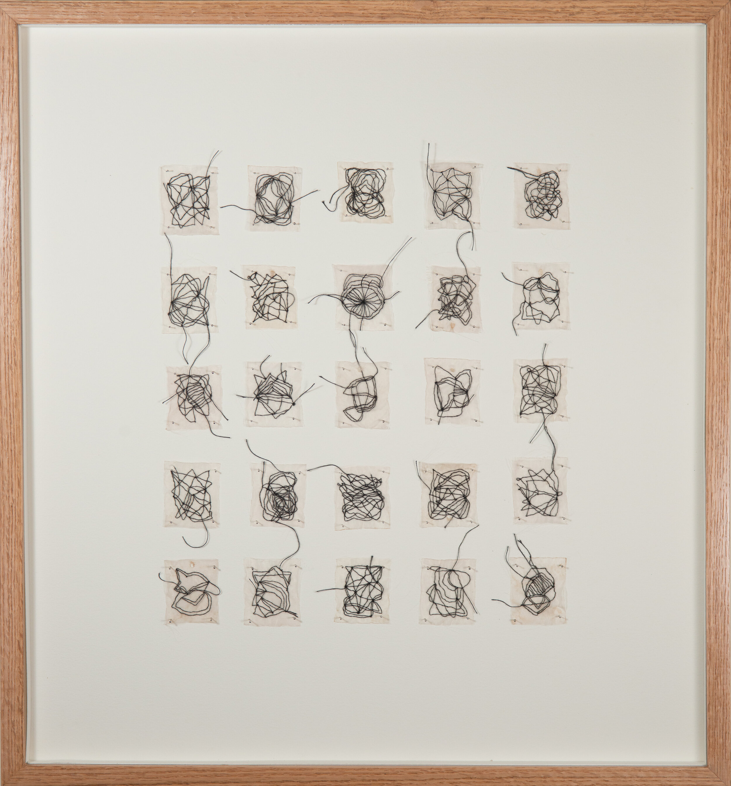  Untitled (Our Black Thread), 2021, embroidery on organza teabags in wooden frame, 62 x 62 cm 