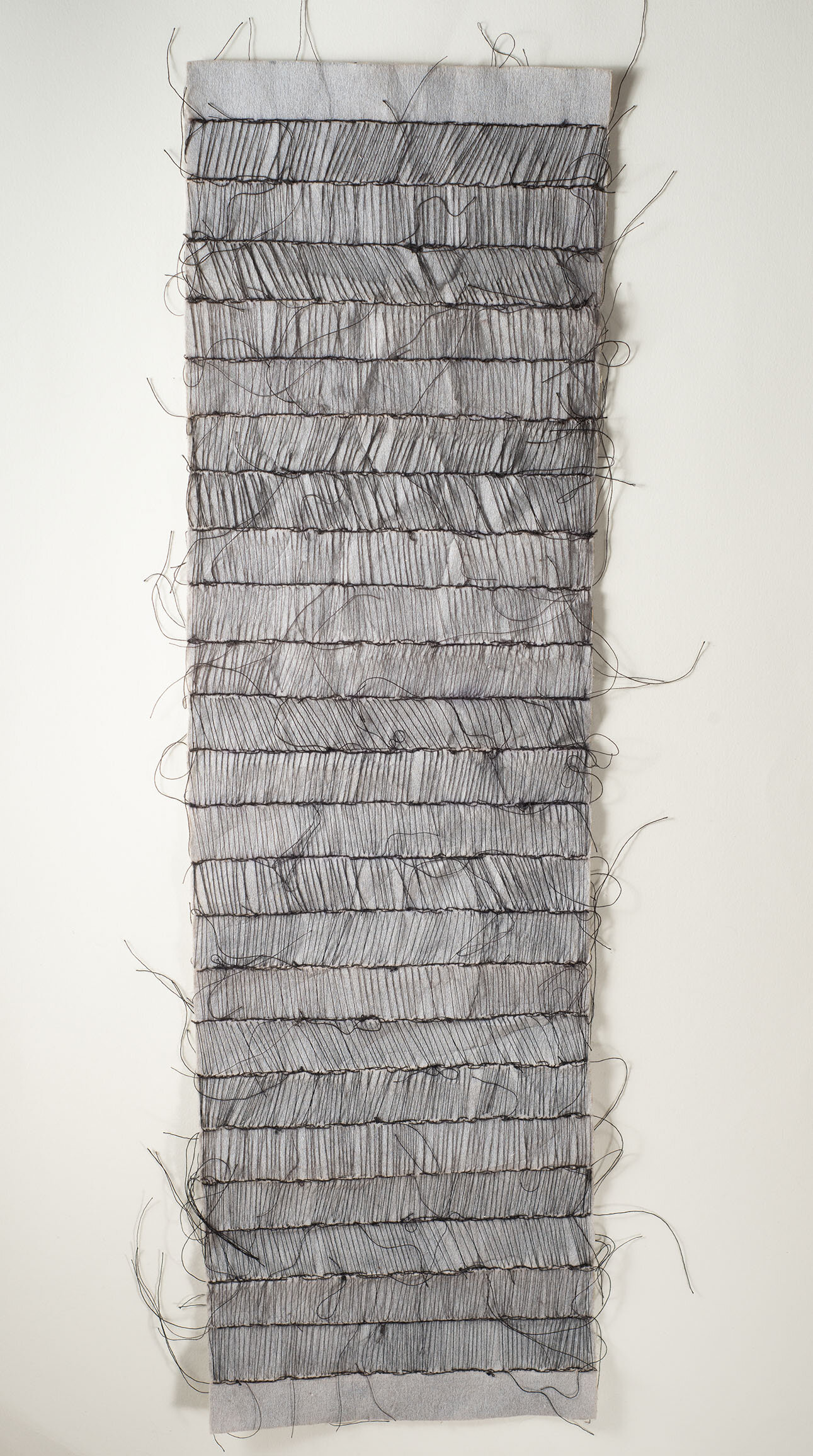  Untitled (Our Black Thread), 2021, embroidery on car filter fabric in wooden frame, 85 x 45 cm 