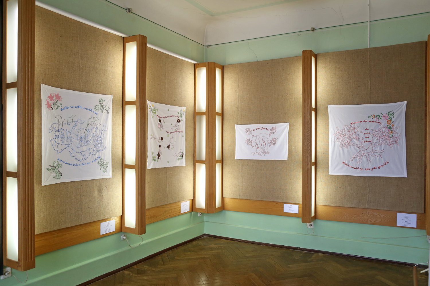  Installation view - They Said Everything They Couldn’t Say And You Fell Silent, 2021.  7 pieces of embroidered works on vintage fabrics. Supported by SAHA – Supporting Contemporary Art from Turkey. Photo credit by Margarita Ogolceva 