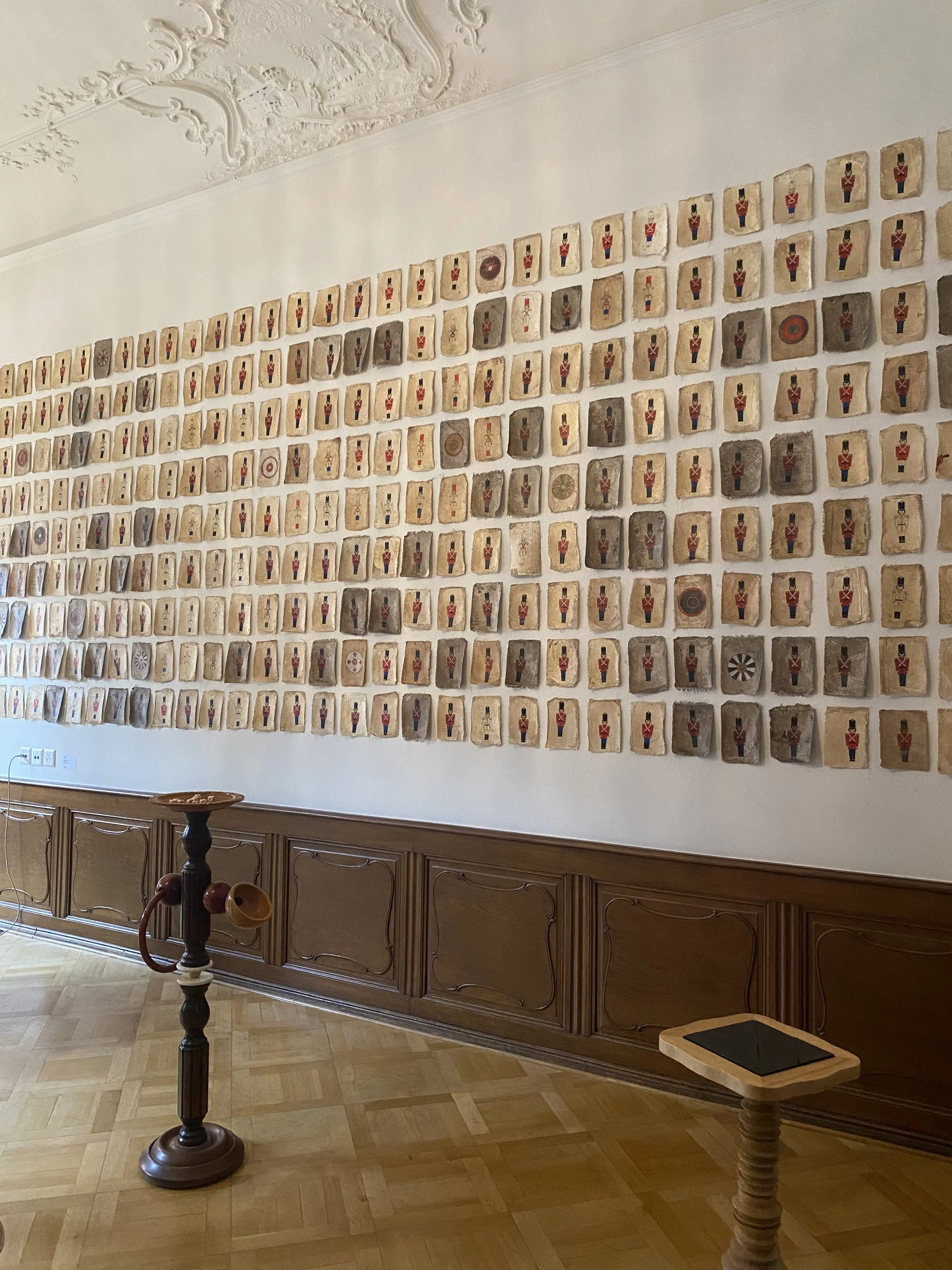  Installation view from Basel Social Club 2025   I, Pet Lion(Toy Soldiers)  , 2014-2018, 324 acrylic and ink on found fabric paintings, 20 x 15 cm each 