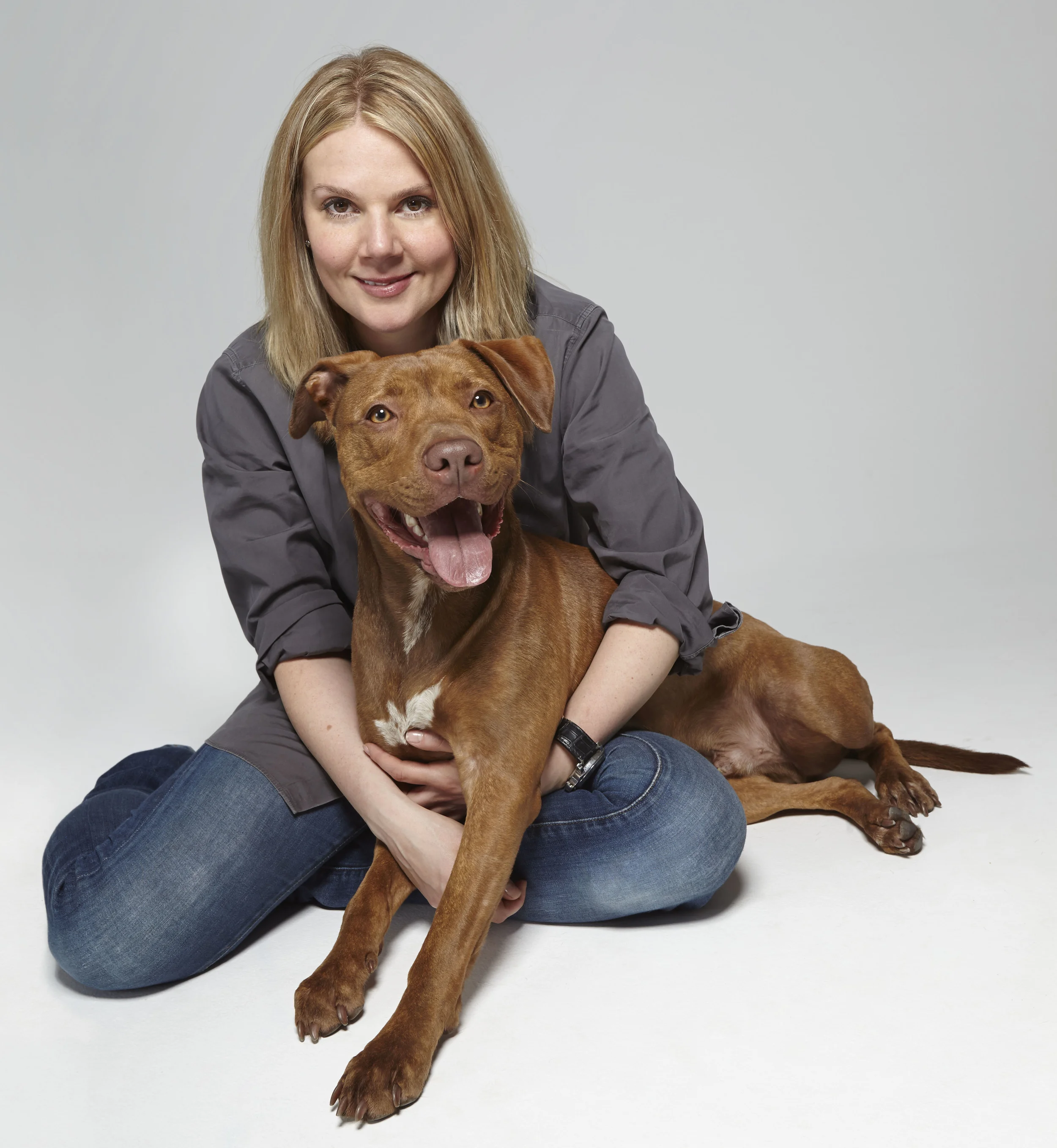 DAN. Rescued from the euthanasia list at a kill shelter in Manhattan, Dan is sitting with Sav-a-Bull Founder Colby, who is also his mom.