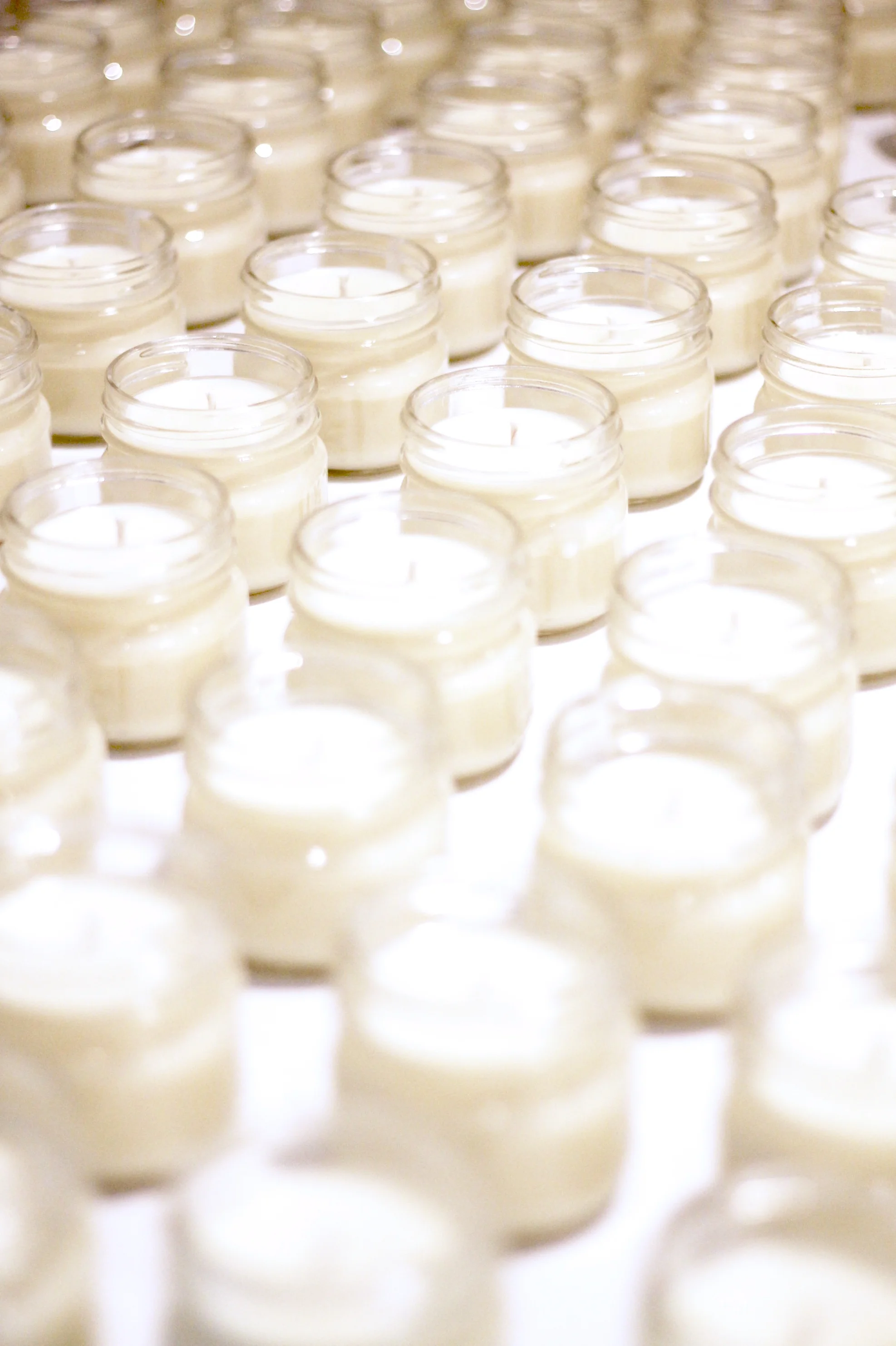 candlesinjarsrightafterbeingpouredsetup.jpg