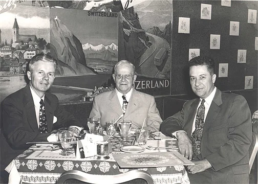 Uncle John Russell, Edward and Al Wellmeier (my dad) at a Chicago restaurant, mid-1950s.