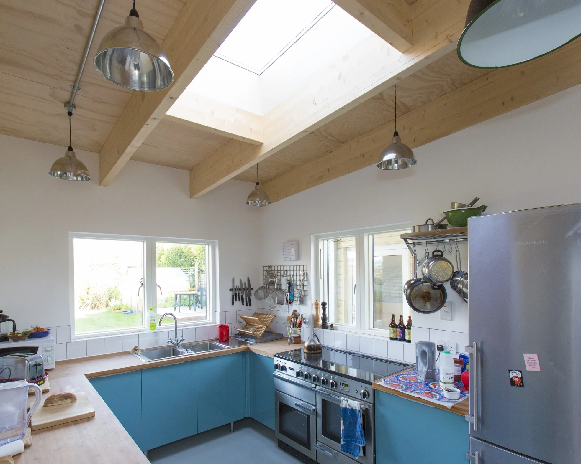 Church Lane, Lewes This extension features exposed laminated timber beams and plywood ceilings to enhance its already high roof.