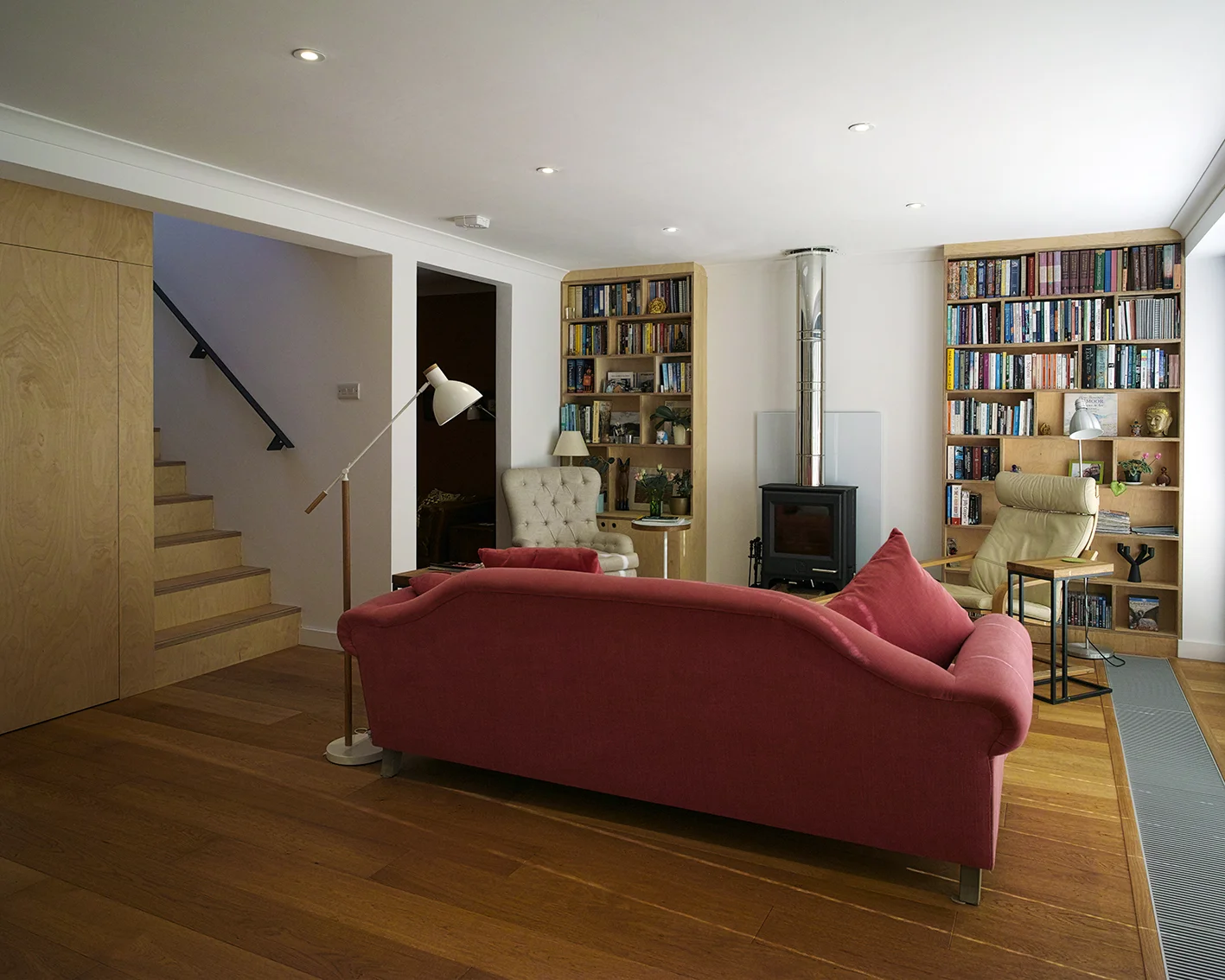 Southover High Street, Lewes We transformed this dark and poorly laid-out house, creating a light and airy living space, and inserted a new top-lit staircase with birch-faced plywood and concealed lighting.