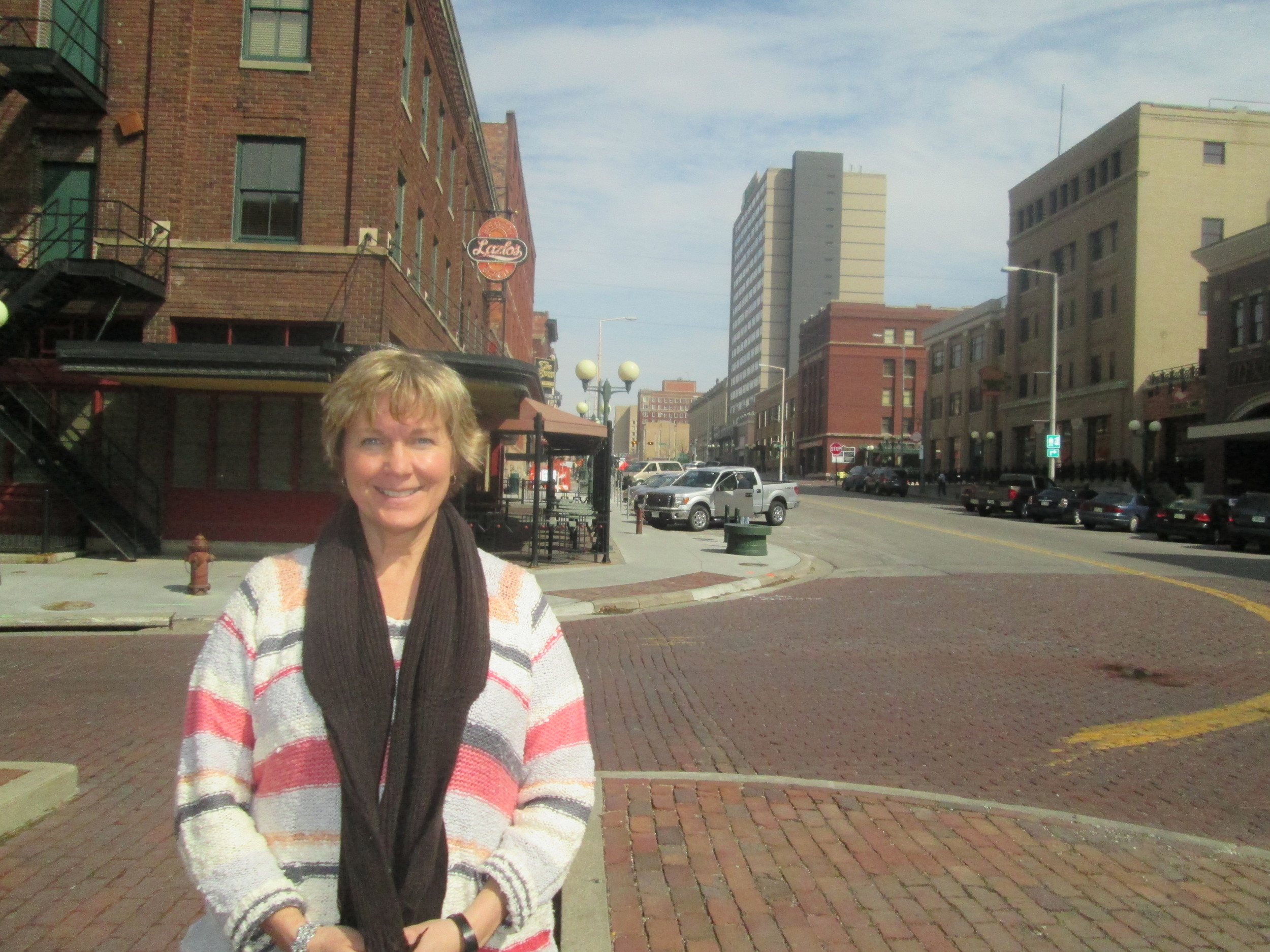 Linda Hubka, the on-site market manager, stands in the Haymarket where the streets will begin to be lined with tents.